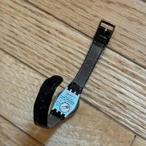 Swatch  Swiss Irony Lady Reverence Black band and Gold  Rim Classic Timepiece Swatch | Accessories | Swatch Swiss Irony Lady Reverence  main image 2